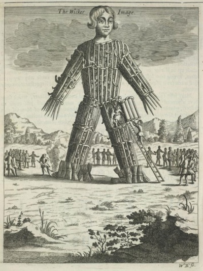 17世紀に描かれた、巨大な人型の檻「ウィッカーマン」。ユリウス・カエサルによると、ケルトには、編み細工で作った人型の像に生贄を閉じ込め、火をつけるという慣習があった。（PHOTOGRAPH BY FINE ART IMAGES, HERITAGE IMAGES/GETTY）